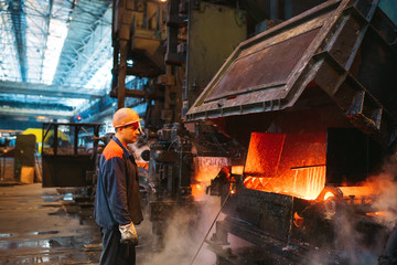 Wall Mural - Workers in the steel mill.