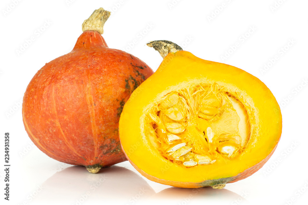 Group of one whole one half of fresh red kuri pumpkin hokkaido variety ...