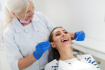 Sticker - Woman having teeth examined at dentists