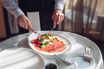 Wall Mural - Red beef carpaccio in a white plate,