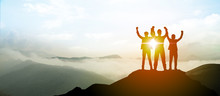 Silhouette Of Business Team Show Arm Up On Top Of The Mountain. Leadership And Success Concept.