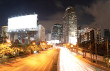Fototapeta  - Motion light traffic on highway in City 