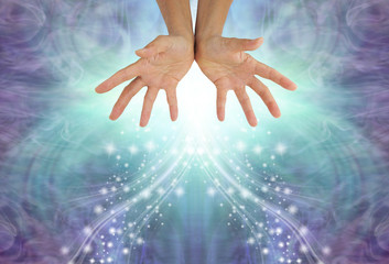 Wall Mural - Sending cooling blue energy - female open hands against a wispy ethereal blue gaseous background with sparkles
