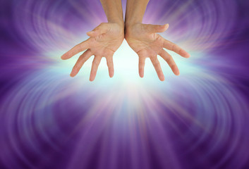 Wall Mural - Fantabulous Healing Energy For You - female with wide open hands against a stunning radiating light form on purple background with copy space below