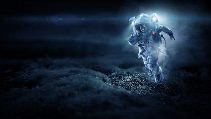 Wall Mural - Spaceman running fast. Mixed media