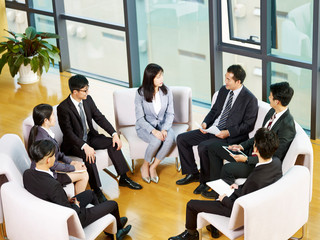 Wall Mural - team of asian business people meeting in office