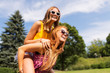 © Syda Productions - leisure, people and friendship concept - happy teenage girls or friends having fun at summer park