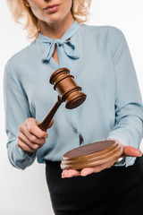 Canvas Print - cropped shot of female judge holding wooden hammer isolated on white