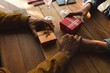 © Wavebreak Media - Couple with gift boxes sitting in cafe