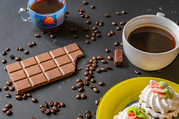 flat lay of bitten chocolate bar on dark surface f