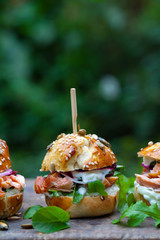 Wall Mural - Brioche buns with hot smoked salmon, beetroot, salad and yogurt dressing