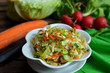 © DEMI VAA SUNILA  - Young cabbage salad with carrot in a white bowl