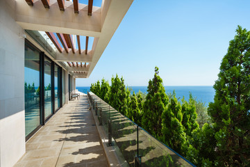 Terrace of a spacious luxury villa with a picturesque sea view