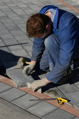 Wall Mural - laying the paving stones