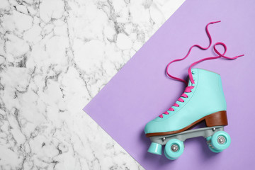 Wall Mural - Stylish quad roller skate on color background, top view