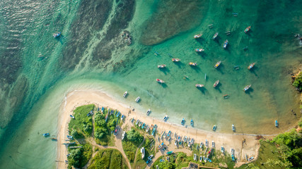 Aerial view of beautiful seascape with fishing boats  in the coast