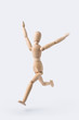 © voyata - running wooden mannequin isolated on white background