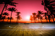 wooden floor basketball court with view sunset tropical beach