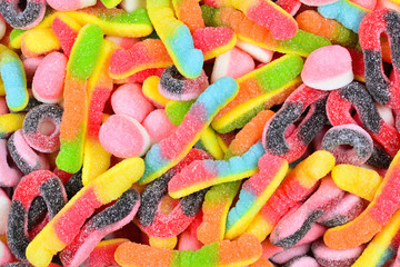 Assorted juicy colorful  gummy candies. Top view.