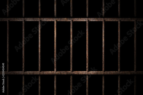 Cuadros en Lienzo Old prison rusted metal bars cell lock with dark and bright in the jail