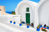 Fototapeta Do pokoju - Traditional greek architecture on Santorini island, Greece.