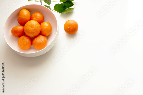 White China Bowl Filled With Juicy Fresh Mandarins On White Background Fresh Organic Mandarins Fruit For Healthy Life And Detox Snacks Picture Design For Foods Background Top View Buy This Stock
