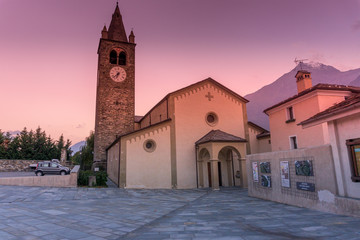 church with bell tower at sunset