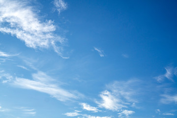 Blue sky and white puffy clouds.