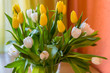 Bouquet of yellow and white tulips. Easter bouquet. Spring flowers