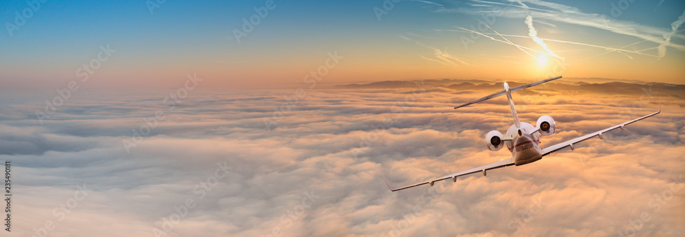 Private jet plane flying above dramatic clouds. - obrazy, fototapety, plakaty 