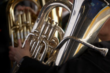 TUBA PLAYER IN BRASS BAND