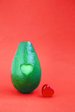Minimal Concept With Green Avocado And Heart