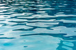 Patterns and ripples of swimming pool water surface