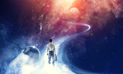 Wall Mural - businessman and cosmos concept
