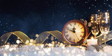 New Year's Clock With Christmas Decorations On Snow