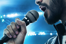 Close Up Singer Singing With Microphone
