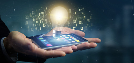 Poster - Businessman holding a bulb lamp idea concept with data all around 3d rendering
