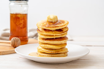 Wall Mural - pancakes with butter and honey