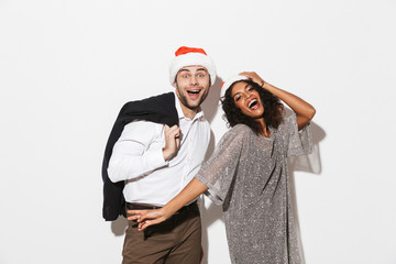 Wall Mural - Cheerful young smartly dressed couple