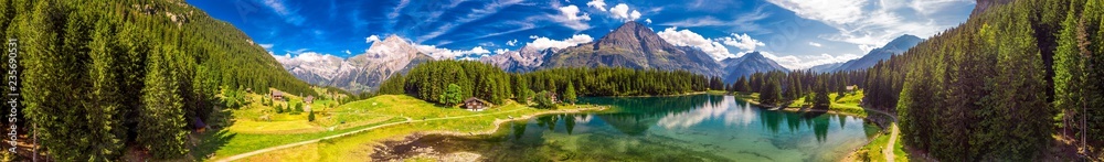 Arnisee with Swiss Alps. Arnisee is a reservoir in the Canton of Uri, Switzerland, Europe - obrazy, fototapety, plakaty 