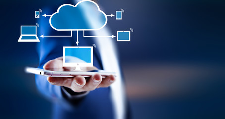 man typing with multimedia concept above