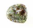 polished Peridot ( olivine) crystals in stone