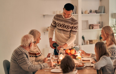 Wall Mural - The family having a christmas dinner