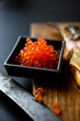 © Andrew Scrivani - Close up of red caviar in bowl