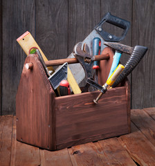 Poster - grungy old tools on a wooden background