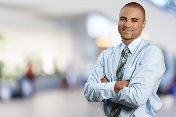 Wall Mural - Happy business man in black suit