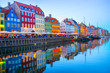illuminated Nyhavn embankment by canal