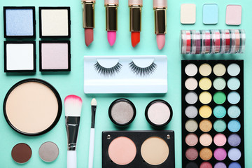 Poster - Different makeup cosmetics on mint background