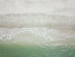 © instagram.com/_alfil - Aerial view of waves on the sandy beach