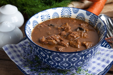 Canvas Print - Goulash soup with pork and mushrooms.